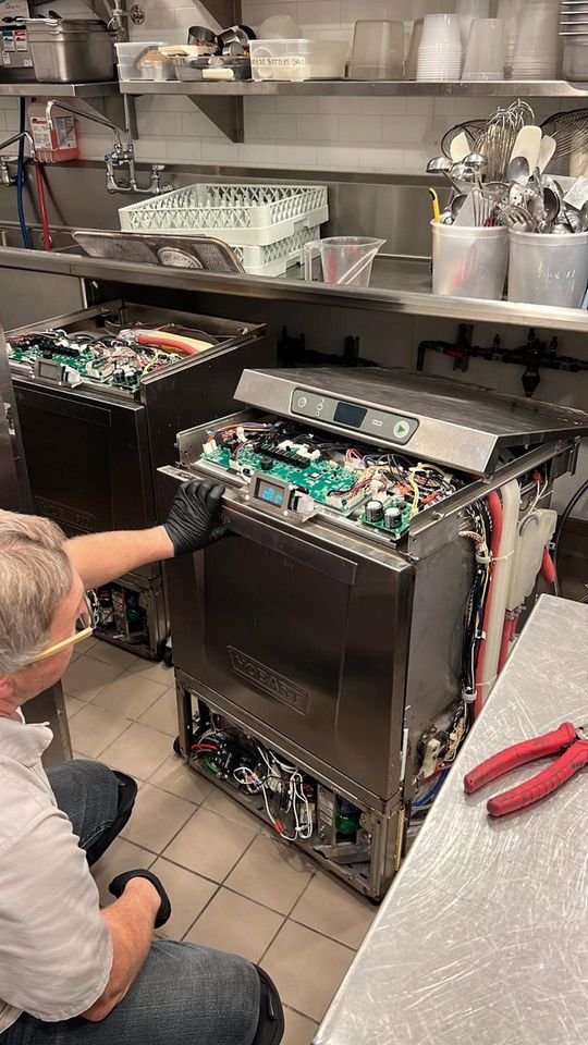 ARHC Service technicians repairing commercial kitchen equipment