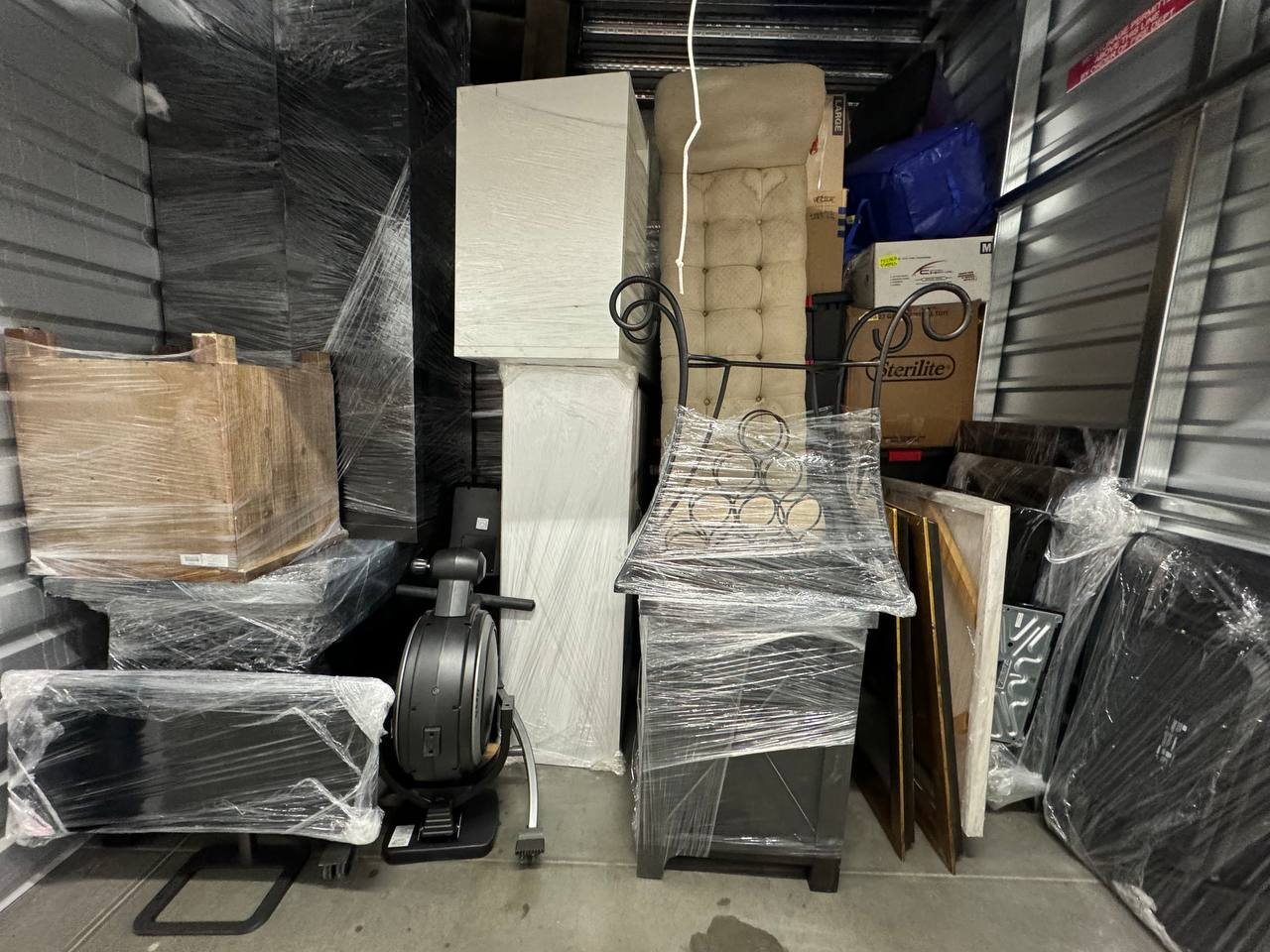 Beezzee Movers team loading protected sofa and furniture into truck in Los Angeles, showing proper packing and damage-free moving techniques