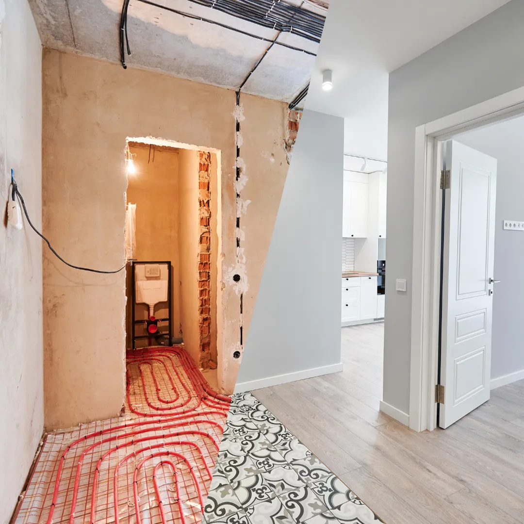 Hallway and flooring renovation before and after by Monarch Contracting Group — radiant heat flooring installation in New York City