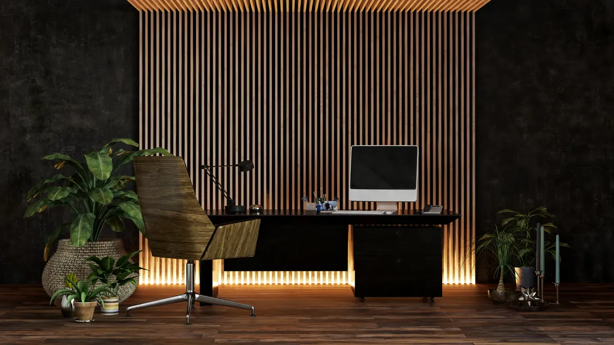 A home office with a wood slat feature wall and integrated lighting in Queens