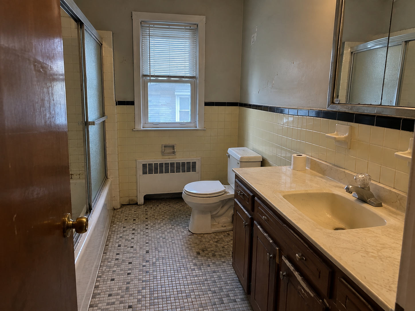 Bathroom renovation before — old bathroom stripped to studs by Monarch Contracting Group Queens, NY